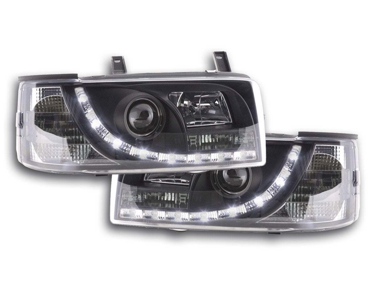 Scheinwerfer Set Daylight LED TFL-Optik VW Bus Typ T5 03-09 schwarz Scheinwerfer Set Daylight LED TFL-Optik VW Bus Typ T5 03-09 schwarz